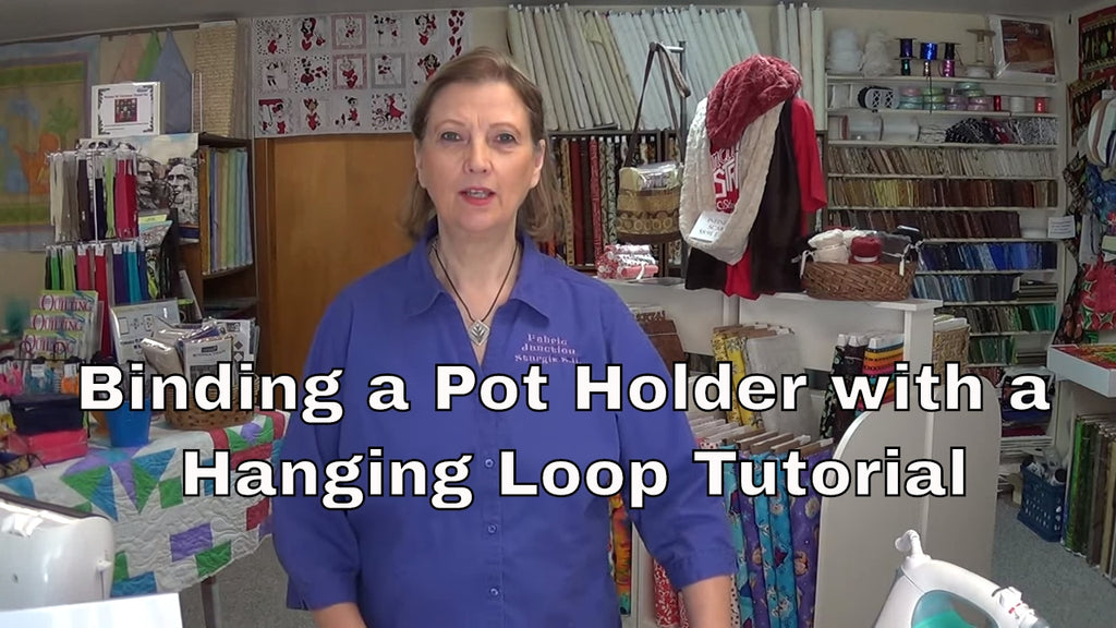 Binding a pot holder with hanging loop