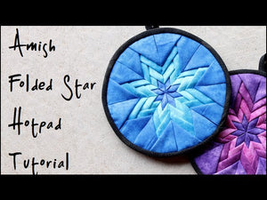 Learn how to make an Amish style folded star quilted hotpad! Or potholder if you prefer