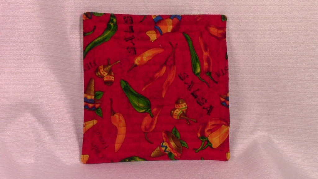 Easy Pot Holder: 2 fabric squares, cotton batting, very detailed sewing instructions, very quick project